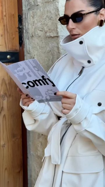 An ivory trench with architectural lines and a cinched waist.
Protective yet polished.
Soft armor for the modern woman.