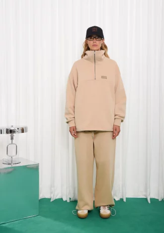 SELFHOOD ZIPPED SWEATER